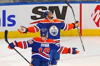 Nov 15, 2023; Edmonton, Alberta, CAN; Edmonton Oilers forward Evander Kane (91) celebrates his over-time winning goal against the Seattle Kraken  at Rogers Place. Mandatory Credit: Perry Nelson-USA TODAY Sports