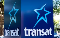 An Air Transat sign is seen in Montreal on May 31, 2016. Quebec real estate developer Group Mach Inc. has made a takeover offer for Transat AT Inc. worth $14 per share in cash. The offer comes after Transat announced last month it was in exclusive talks to be acquired by Air Canada for $13 per share. THE CANADIAN PRESS/Paul Chiasson