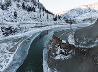 A washed out portion of the former Highway 8 is seen along the Nicola River near Spences Bridge, B.C., on Wednesday, November 9, 2022. A temporary road linking Spences Bridge with Merritt is seen on the other side of the river. Darryl Dyck/The Globe and Mail