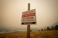 A 43-year-old Kamloops, B.C., woman has been sentenced for two arson fires she admitted to setting. A warning sign about fire risk is seen as smoke from wildfires fills the air, in Kelowna, B.C., Saturday, Aug. 19, 2023. THE CANADIAN PRESS/Darryl Dyck