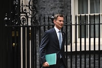 (FILES) In this file photo taken on November 17, 2022 Britain's Chancellor of the Exchequer Jeremy Hunt leaves Downing Street in central London on his way to make a full budget statement in the House of Commons. - Britain's finance minister jeremy Hunt dismissed "gloom" over its recession-threatened economy, on January 27, 2023 and vowed to tap into Brexit opportunities and tackle rampant inflation to boost growth during a cost-of-living crisis. He laid out the Conservative government's growth plan in London's City finance district, following recent criticism from the business community -- and insisted that the nation was not in decline. (Photo by JUSTIN TALLIS / AFP) (Photo by JUSTIN TALLIS/AFP via Getty Images)