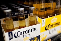 FILE PHOTO: Bottles of the beer, Corona, a brand of Constellation Brands Inc., sit on a supermarket shelf in Los Angeles, California April 1, 2015.  REUTERS/Lucy Nicholson/File Photo