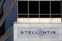 FILE PHOTO: Stellantis logo is seen on the company's headquarters in Poissy near Paris, France, February 20, 2022. REUTERS/Gonzalo Fuentes/File Photo