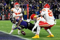 Baltimore Ravens wide receiver Zay Flowers (4) fumbles into the end zone for a touchback against the Kansas City Chiefs during the second half of the AFC Championship NFL football game, Sunday, Jan. 28, 2024, in Baltimore. (AP Photo/Nick Wass)