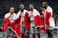 While the goal is first to qualify for the Paris Olympics, Canada's men's 4x100-metre relay team isn't settling for just that. Canada's Andre De Grasse, Brendon Rodney, Aaron Brown and Jerome Blake celebrate after winning the bronze medal in the men's 4 x 100m during the summer Tokyo Olympics in Tokyo, Friday, Aug. 6, 2021. THE CANADIAN PRESS/Nathan Denette