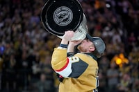 Vegas Golden Knights center Jack Eichel (9) skates with the Stanley Cup after the Knights defeated the Florida Panthers 9-3 in Game 5 of the NHL hockey Stanley Cup Finals Tuesday, June 13, 2023, in Las Vegas. The Knights won the series 4-1. (AP Photo/John Locher)