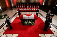 Sentinels surround the casket of former prime minister Brian Mulroney as he lies in state at the Sir John A. Macdonald Building, across from Parliament Hill in Ottawa, on Tuesday, March 19, 2024. THE CANADIAN PRESS/Justin Tang