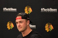 CHICAGO, ILLINOIS - APRIL 13: Jonathan Toews #19 of the Chicago Blackhawks speaks to the media following a game against the Philadelphia Flyers at United Center on April 13, 2023 in Chicago, Illinois. The Flyers defeated the Blackhawks 5-4 in overtime. (Photo by Stacy Revere/Getty Images)