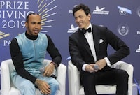 FILE - Formula One Champion Lewis Hamilton of Britain, left, and Mercedes team principal Toto Wolff attend the 2019 FIA Champions' Press Conference in Paris, Friday, Dec. 6, 2019.  Lewis Hamilton’s decision to leave Mercedes for Ferrari shocked the Formula One world with even Mercedes team principal Toto Wolff calling it a “surprise.” Wolff said he had heard rumors that Hamilton might leave but didn’t know for sure until the F1 great confirmed it over breakfast on Wednesday, Jan. 31, 2024 at Wolff’s home in Oxford, England. (AP Photo/Michel Euler, File)