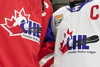 Team Red and Team White logos are shown following the CHL Top Prospects Game in Hamilton, Ont. on January 16, 2020. A new lawsuit alleges that Canadian major junior hockey leagues violate antitrust laws in the United States by colluding to restricting the negotiation powers of players. THE CANADIAN PRESS/Peter Power