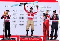 Alpine Skiing - FIS Alpine Ski World Cup - Men's Super G - Kvitfjell, Norway - February 18, 2024 Gold medallist Austria's Vincent Kriecmayr celebrates on the podium during the Men's Super G medal ceremony with silver medallist Canada's Jeffrey Read and bronze medallists Switzerland's Marco Odermatt and Italy's Dominik Pais Photo: Geir Olsen / NTB   Geir Olsen/NTB via REUTERS    ATTENTION EDITORS - THIS IMAGE WAS PROVIDED BY A THIRD PARTY. NORWAY OUT. NO COMMERCIAL OR EDITORIAL SALES IN NORWAY.