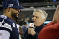 FILE - ESPN reporter Chris Mortensen, right, interviews Dallas Cowboys quarterback Dak Prescott, left, after an NFL football game against the New York Giants, Nov. 5, 2019, in East Rutherford, N.J. Mortensen, the award-winning journalist who covered for the NFL for 39 years, including 32 as a senior analyst at ESPN, has died. He was 72. ESPN confirmed Mortensen’s death on Sunday, March 3, 2024. (AP Photo/Adam Hunger, File)