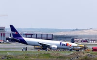 A general view of a FedEx Airlines Boeing 767 BA.N cargo plane, that landed at Istanbul Airport on Wednesday without deploying its front landing gear but managed to stay on the runway and avoid casualties, on a runway in Istanbul, Turkey, May 8, 2024. REUTERS/Umit Bektas
