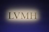 (FILES) World's top luxury group LVMH's logo is displayed during the presentation of the group's annual results 2022 in Paris on January 26, 2023. LVMH group announced on July 24, 2023, that it was the sixth premium partner for the Paris 2024 Olympic Games, allowing the comittee to almost reach their objective of 1.24 billion euros in partnerships. (Photo by Stefano Rellandini / AFP) (Photo by STEFANO RELLANDINI/AFP via Getty Images)