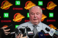 Vancouver Canucks head coach Bruce Boudreau responds to questions during a news conference after an NHL hockey game against the Edmonton Oilers, in Vancouver, on Saturday, January 21, 2023. THE CANADIAN PRESS/Darryl Dyck