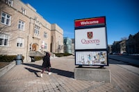 A large sign and campus map on Union St. on the campus of Queen's University in Kingston, Ont., are photographed on Jan 20 2021.