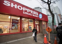 Customers leaving the Shoppers Drug Mart store on Yonge St. near St.Clair Ave., are photographed on Mar 17 2020. The drug store chain had offered the first hour opening to seniors or those with disabilities. One customer said that she was told by staff that this only applied to those stores that sold food products.
