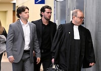 Former Victoriaville Tigres junior major hockey league players Nicolas Daigle, left, and Massimo Siciliano, follow defence lawyer Michel Lebrun, right, out of the courtroom on Wednesday, Oct. 11, 2023, in Quebec City. A Quebec judge will render a sentence in July for two former Quebec major junior hockey players who pleaded guilty to sexually assaulting a minor in June 2021 as their team celebrated a championship at a hotel. THE CANADIAN PRESS/Jacques Boissinot