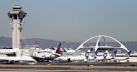 FILE - Airplanes sit on the tarmac at Los Angeles International Airport Friday, Nov. 1, 2013. A United Airlines jetliner headed to Mexico City from San Francisco made an emergency landing in Los Angeles on Friday, March 8, 2024 after the crew reported a hydraulics issue, in the fourth emergency involving a United Airlines flight this week. (AP Photo/Gregory Bull, File)