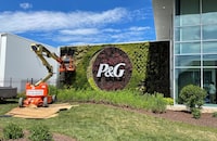 FILE PHOTO: A plant wall with Procter & Gamble's logo is pictured at the entrance to the company's highly automated cleaning products factory in Tabler Station, West Virginia, U.S., May 28, 2021. Picture taken May 28, 2021. REUTERS/Timothy Aeppel/File Photo