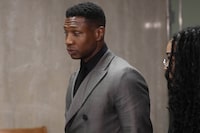 FILE - Jonathan Majors leaves a courtroom in New York, Dec. 18, 2023. Majors is scheduled to be sentenced Monday, April 8, 2024 in a New York court after he was convicted of assaulting his former girlfriend. (AP Photo/Seth Wenig, file)
