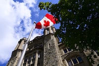 The Canada Revenue Agency (CRA) headquarters Connaught Building is pictured in Ottawa on Aug. 17, 2020. A 33-year-old Ottawa man was scheduled to appear in court Monday after being arrested and charged with arson in connection with what police say was a fire at the building. THE CANADIAN PRESS/Sean Kilpatrick