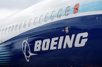 FILE PHOTO: The Boeing logo is seen at the Farnborough International Airshow, in Farnborough, Britain, July 20, 2022. REUTERS/Peter Cziborra/File Photo