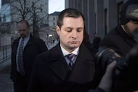 Const. James Forcillo leaves court in Toronto on Monday, Jan. 25, 2016. A former Toronto police officer who shot a teen on an empty streetcar more than a decade ago is taking the stand for a second day at a coroner's inquest. THE CANADIAN PRESS/Chris Young