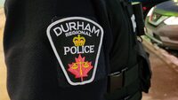 Police in a town east of Toronto say a sixth suspect has been arrested and charged in connection to the double murder of a man and his pregnant wife. A Durham Regional Police badge is shown in Bowmanville, Ont. on Tuesday, Feb. 28, 2023. THE CANADIAN PRESS/Doug Ives</p>