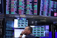 A trader works on the trading floor at the New York Stock Exchange (NYSE) on April 4.