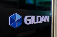 The Gildan logo is seen outside their offices in Montreal, Monday, Dec. 11, 2023. U.S. investment firm Browning West has requested a special meeting of Gildan Activewear Inc. shareholders to replace a majority of the company's directors and reinstate Glenn Chamandy as chief executive.THE CANADIAN PRESS/Christinne Muschi