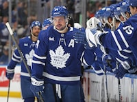 TORONTO, CANADA - DECEMBER 19:  Auston Matthews #34 of the Toronto Maple Leafs celebrates his 25th goal of the season against the New York Rangers during the third period in an NHL game at Scotiabank Arena on December 19, 2023 in Toronto, Ontario, Canada. The Rangers defeated the Maple Leafs 5-2. (Photo by Claus Andersen/Getty Images)
