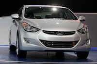 FILE - A 2013 Hyundai Elantra Coupe is shown at the Chicago Auto Show in Chicago on Feb. 8, 2012. In September, 2023, Hyundai and Kia issued a recall of 3.4 million of its vehicles in the United States, including the 2013 Hyundai Elantra. (AP Photo/Nam Y. Huh, File)