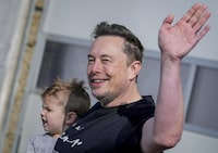 FILE - Tesla CEO Elon Musk waves as he leaves the Tesla Gigafactory for electric cars after a visit in Gruenheide near Berlin, Germany, Wednesday, March 13, 2024. Musk abruptly canceled “The Don Lemon Show,” a talk show on the social network X, after its former CNN anchor host recorded an interview with the billionaire for its first episode. (AP Photo/Ebrahim Noroozi)