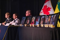 Photographs of those killed during the James Smith Cree Nation and Weldon mass casualty homicides on display as the Saskatchewan RCMP Major Crimes to provide preliminary timeline presentation of the events during a media event in Melfort, Sask. on Thursday, April 27, 2023. THE CANADIAN PRESS/Liam Richards
