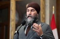 New Democratic Party leader Jagmeet Singh speaks with reporters in the Foyer of the House of Commons before Question Period, Monday, February 5, 2024 in Ottawa.  THE CANADIAN PRESS/Adrian Wyld