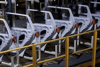 Statistics Canada says manufacturing sales fell in December, weighed down by production slowdowns for retooling in some auto assembly plants in Ontario. A general view of production along the Honda CRV production line is shown during a tour of the Honda manufacturing plant in Alliston, Ont., Wednesday, Apr. 5, 2023. THE CANADIAN PRESS/Cole Burston