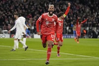 Bayern's Eric Maxim Choupo-Moting celebrates a goal that was later dissallowed during the Champions League round of 16 second leg soccer match between Bayern Munich and Paris Saint Germain at the Allianz Arena in Munich, Germany, Wednesday, March 8, 2023. (AP Photo/Matthias Schrader)