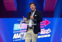 FILE Ñ Tucker Carlson speaks in Phoenix on Dec. 17, 2022. Fox News said Monday, April 24, 2023, that it is parting ways with Carlson, its most popular prime time host who was also the source of repeated controversies and headaches for the network because of his statements on everything from race relations to LGBTQ rights. (Rebecca Noble/The New York Times)