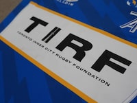 Toronto Arrows team jersey with Toronto Inner-City Rugby Foundation (TIRF) logo on it. Toronto Arrows announced today they have selected the local non-profit community impact organization as its lead partner for the 2023 Major League Rugby season. TIRF’s name and logo will be displayed prominently on the front of the Arrows team jerseys throughout the entire season. Credit: Toronto Arrows
