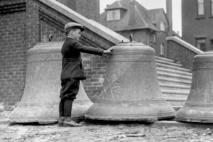 THE BELLS OF ST. JOHN'S -- The ten bells which are to be installed in the tower of St. John's Anglican Church, West Toronto, arrived from England at the week-end and were on view outside the edifice today, April 6, 1924. Three of these fine bells are shown in the picture. The bells will ring out for the first time, it is expected, on Easter Sunday morning, but the ceremony of dedication will not take place until April 27, when Rev. Canon J. J. Cody will be the preacher. Rev. R. MacNamara is the rector of St. John's, the congregation having only a few months ago moved into its new church.  Photo by John Boyd / The Globe and Mail.

Originally published April 7, 1924