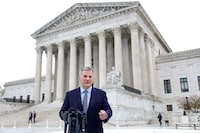 FILE PHOTO: North Carolina Attorney General Josh Stein speaks to the media outside of the United States Supreme Court following oral arguments in Moore v. Harper, a Republican-backed appeal to curb judicial oversight of elections, in Washington, U.S., December 7, 2022. REUTERS/Evelyn Hockstein/File Photo