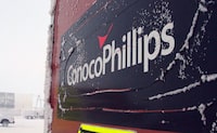 FILE - An ice-covered ConocoPhillips sign is displayed at the Colville-Delta 5, or as it's more commonly known, CD5, drilling site on Alaska's North Slope, Feb. 9, 2016. Construction can proceed related to a major oil project on Alaska’s petroleum-rich North Slope after a federal judge on Monday, April 3, 2023, rejected requests to halt work until challenges to the Biden administration’s recent approval are resolved. (AP Photo/Mark Thiessen, File)