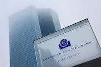 FILE PHOTO: The building of the European Central Bank (ECB) is seen amid a fog  in Frankfurt, Germany December 15, 2022.  REUTERS/Wolfgang Rattay/File Photo