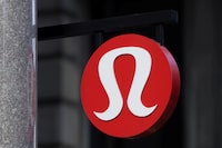 FILE PHOTO: The logo for Lululemon Athletica is seen at a store in Manhattan, New York, U.S., December 7, 2021. REUTERS/Andrew Kelly/File Photo