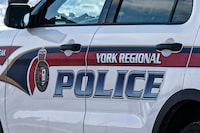 A York Regional Police cruiser parks at the Promenade Mall, where a shooting took place the night before, in Thornhill, Ont., on Monday, Feb., 17, 2020. (Christopher Katsarov/The Globe and Mail)