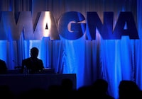 Magna International Inc. logo is seen prior to the company's annual general meeting to begin in Toronto on Friday, May 10, 2013. THE CANADIAN PRESS/Nathan Denette