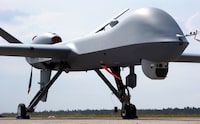An MQ9 Predator drone is displayed at the Berlin Air Show ILA in Berlin, Germany, on May 30, 2016. China on Thursday, April 11, 2024 announced sanctions against two U.S. defense companies, one of which produces the Predator drone, over what it says is their support for arms sales to Taiwan, the self-governing island democracy Beijing claims as its own territory to be recovered by force if necessary. (AP Photo/Michael Sohn, File)