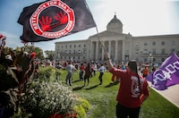 Supporters and family gather at a rally calling for a search of a landfill at the Manitoba Legislature in Winnipeg on Monday, Sept.18, 2023. The families of two slain First Nations women are expected to provide an update in their push to get the federal and provincial governments to fund a search for the women's remains.THE CANADIAN PRESS/John Woods