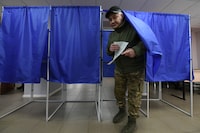 People vote in Russia's presidential election in the Russian-controlled area of the Donetsk region of Ukraine, amid the Russia-Ukraine conflict on March 15, 2024.